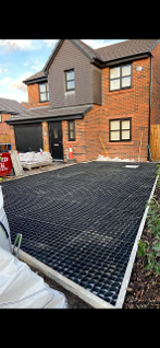 The Ecogrids that have been installed over the top of a bed of 10mm grit sand. The grids have been cut to size and ready for the installation of 10mm limestone infill. 
