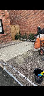 Half of the driveway has now been laid to a resin bound mixture. The edges have been prepared to allow a darker picture frame of resin for aesthetics. North west landscaping solutions
